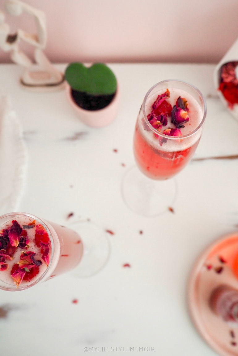 Love at first sip! This Love Potion cocktail is a great mix of everything sweet and bubbly. This cocktail is the perfect for drink for any celebration. #cocktails, #valentinesday
