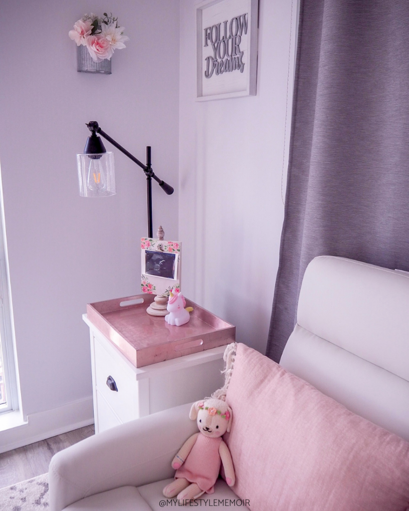 This nursery reveal is the perfect balance of a modern farmhouse style. It is super cozy, warm and the right touches of pink. #nursery #babygirl #baby #nurseryreveal